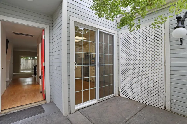 a view of empty room with windows