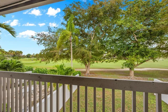 a view of a wooden fence