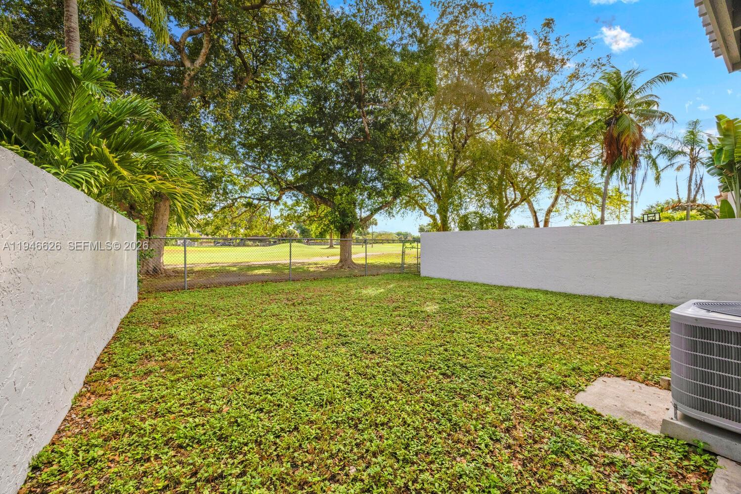13121 Southwest 95th Avenue Miami, FL 33176 - Photo 21 of 41 a view of outdoor space with garden