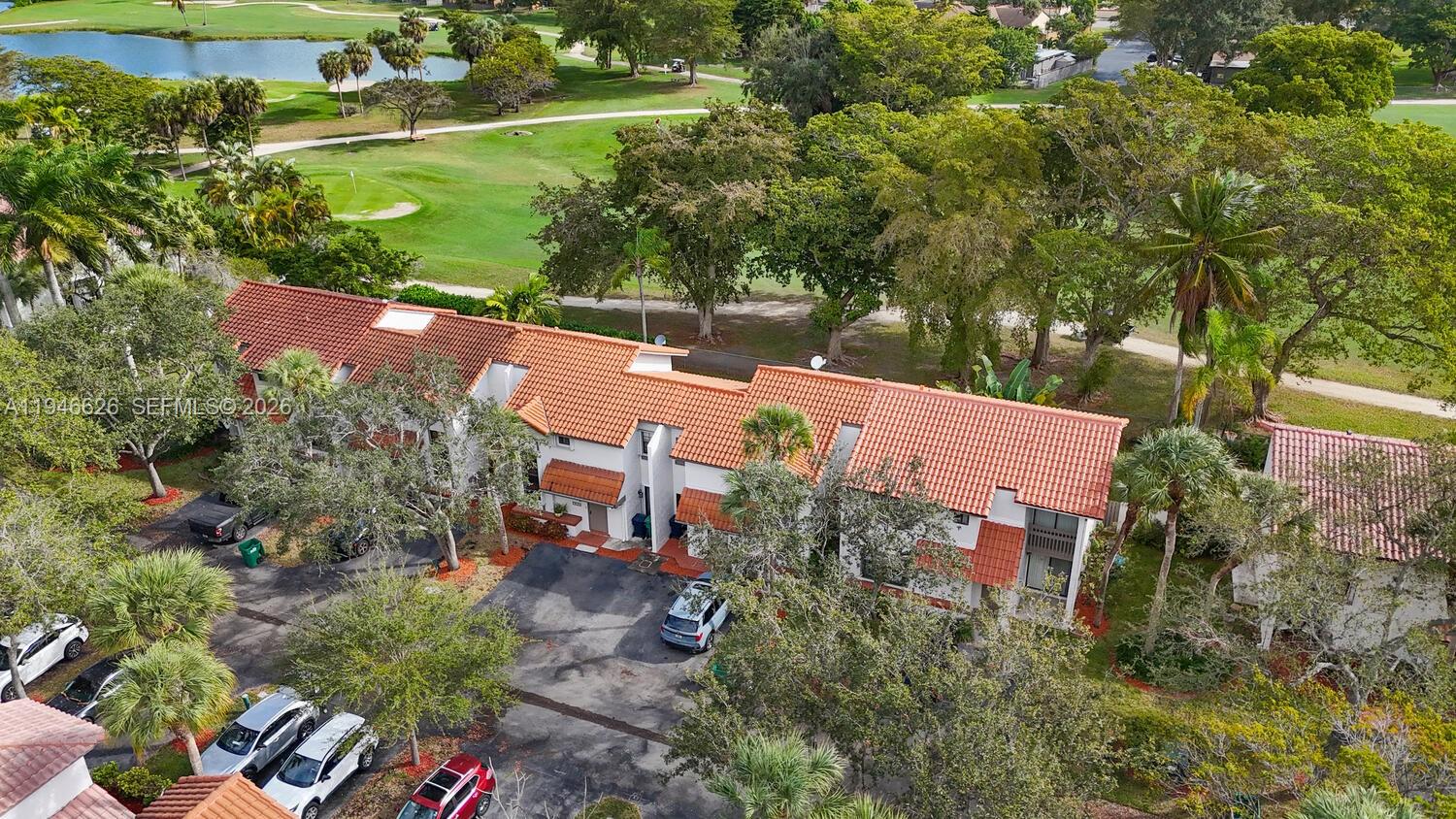 13121 Southwest 95th Avenue Miami, FL 33176 - Photo 34 of 41 an aerial view of house with yard swimming pool and outdoor seating