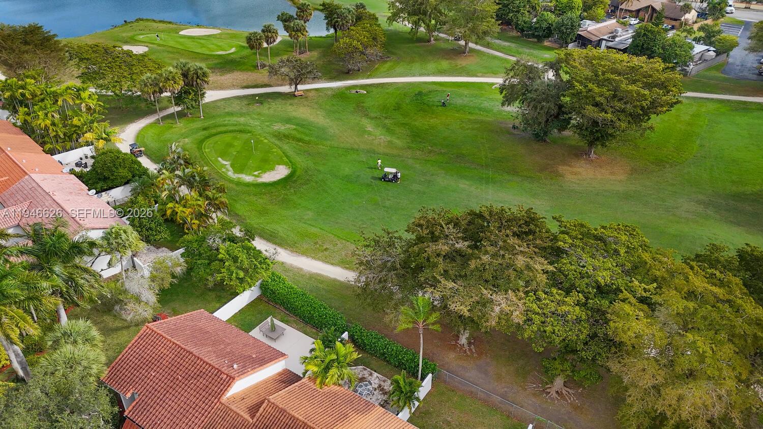 13121 Southwest 95th Avenue Miami, FL 33176 - Photo 37 of 41 a view of a lake with a yard