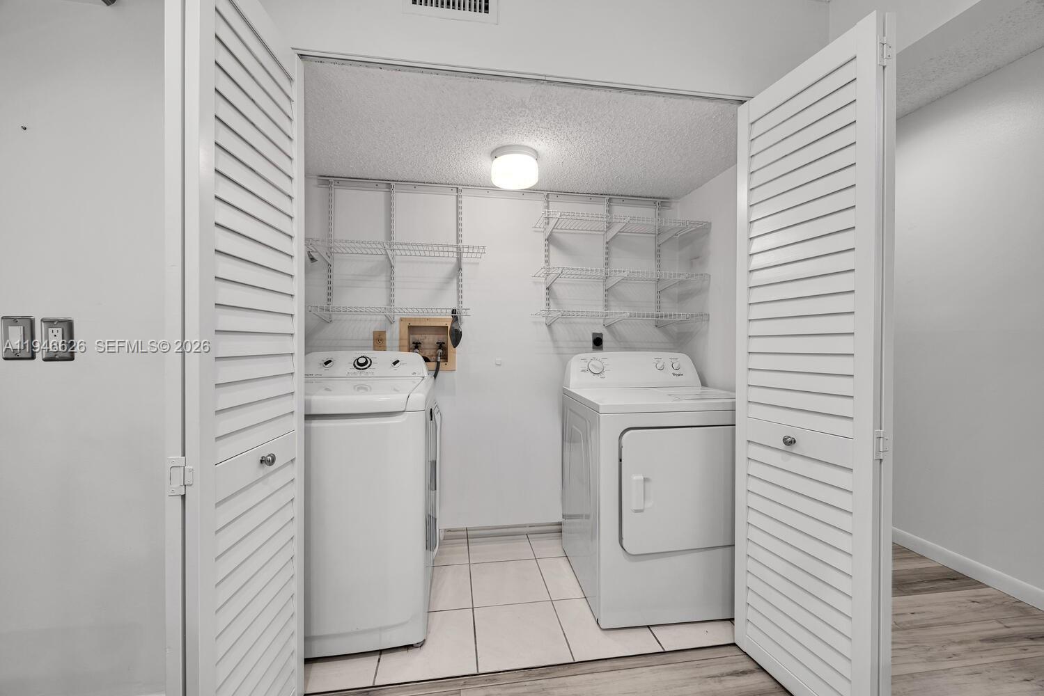 13121 Southwest 95th Avenue Miami, FL 33176 - Photo 9 of 41 a bathroom with a sink a toilet and shower