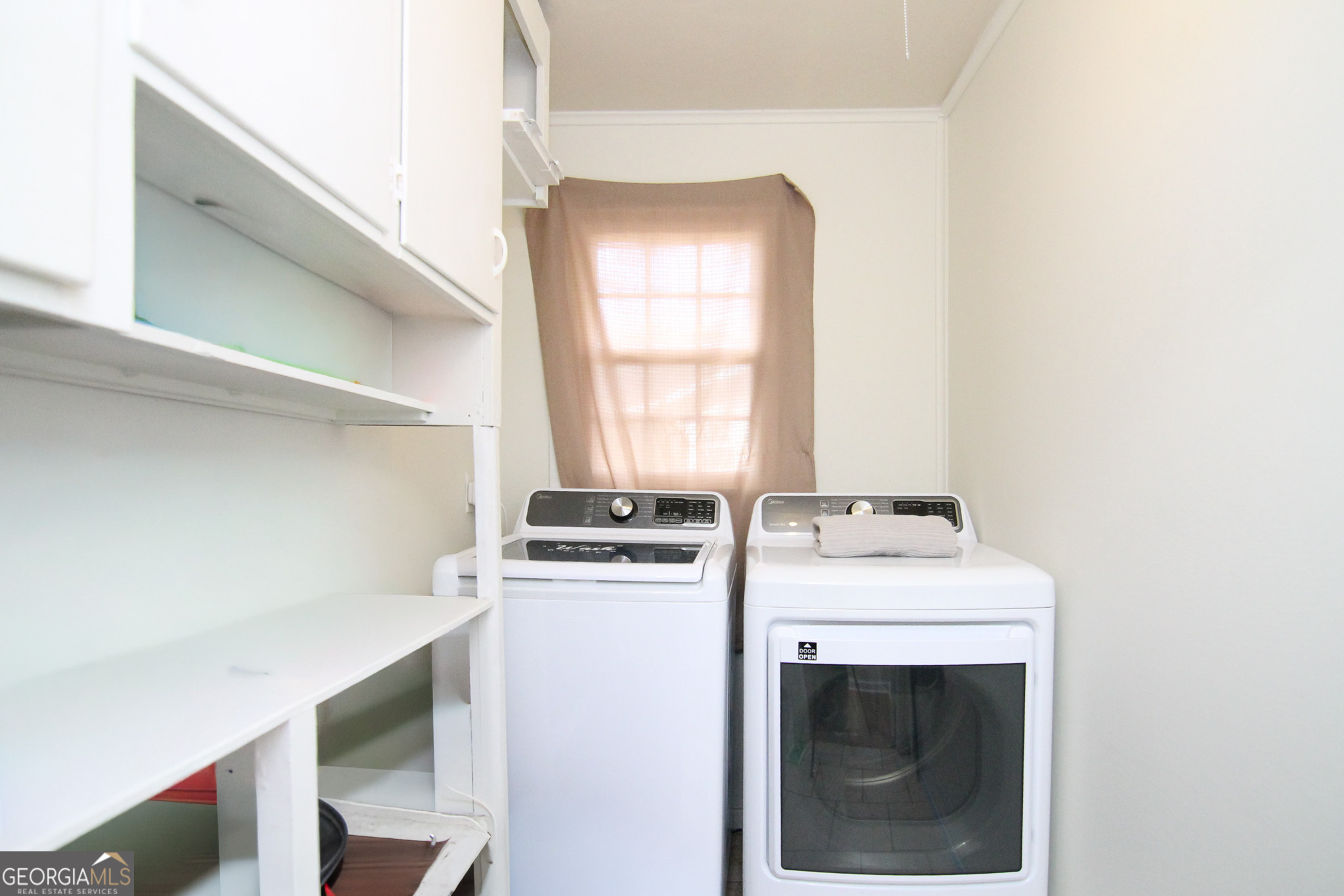 113 Pearce Drive Warner Robins, GA 31093 - Photo 14 of 27 a utility room with dryer and washer