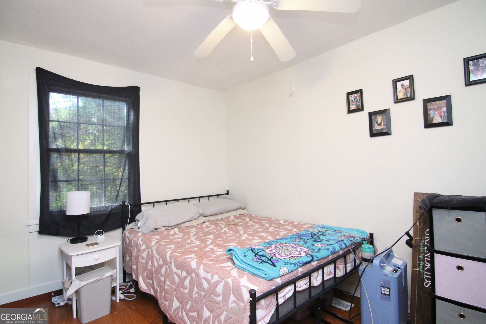 113 Pearce Drive Warner Robins, GA 31093 - Photo 24 of 27 a bedroom with a bed and a window