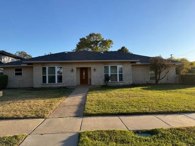 a view of a house with a swimming pool
