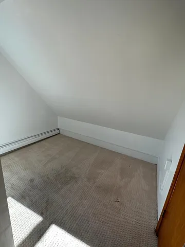 a bathroom with a sink a toilet a mirror and vanity