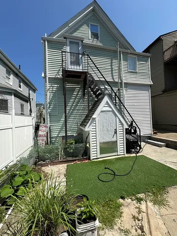 a view of a yard in front of a house