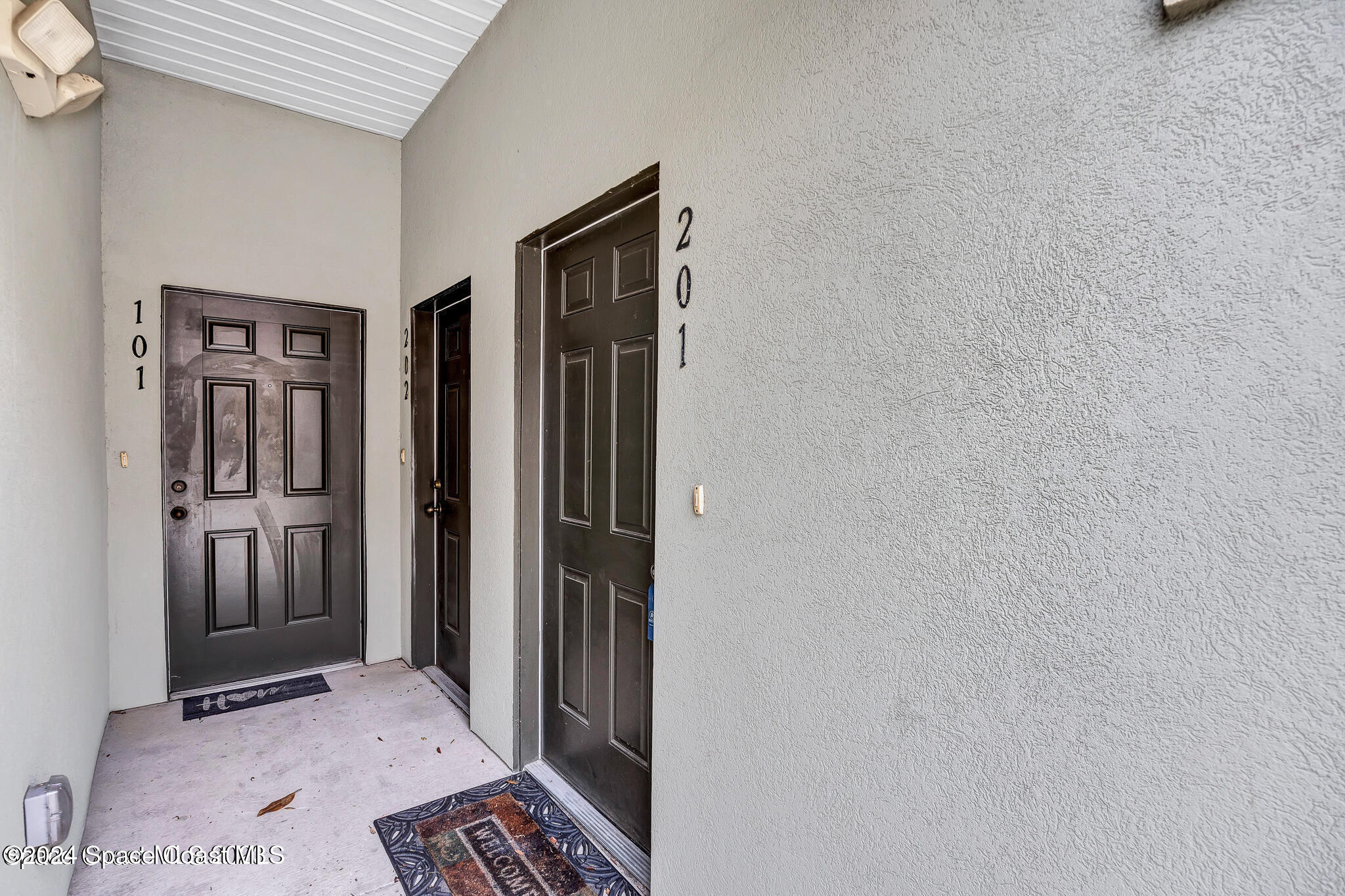 4037 Meander Place, Unit 201 Rockledge, FL 32955 - Photo 2 of 15 meanderdoor