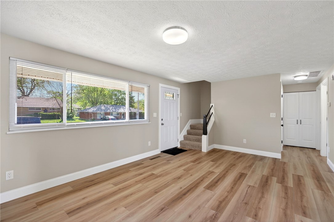 5975 Rosalie Road Dayton, OH 45424 - Photo 44 of 48 This inviting space features durable flooring and abundant natural light, creating a bright atmosphere.