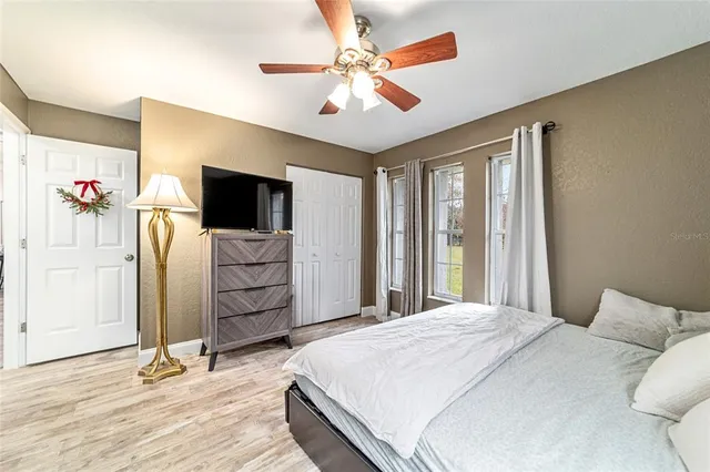 a view of a swimming pool with a yard