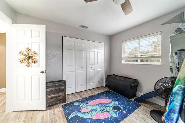 a swimming pool with a trees in the background