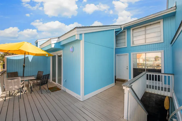 a view of balcony deck and patio