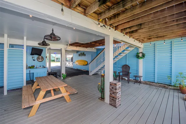 a view of a terrace with a barbeque