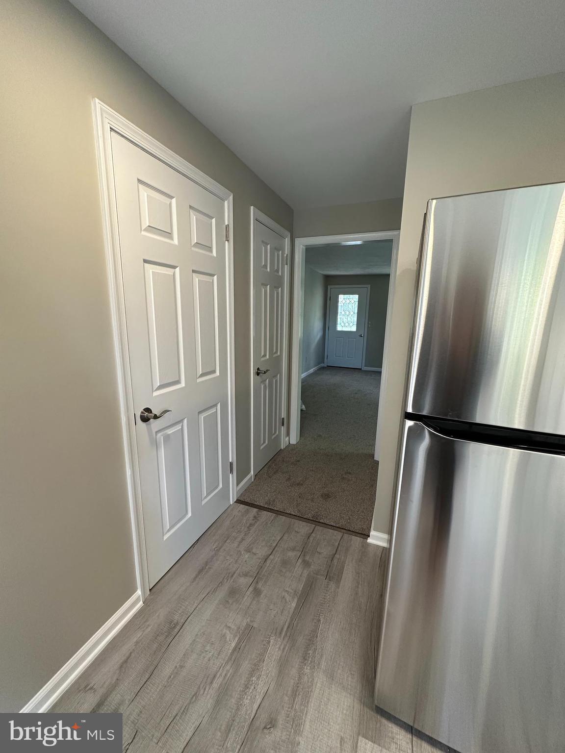 134 A Maple Avenue Dublin, PA 18917 - Photo 6 of 23 a view of a kitchen with a refrigerator