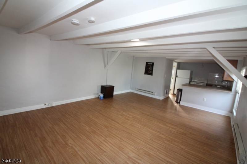 171 Stanton Road, Unit A Flemington, NJ 08822 - Photo 11 of 12 a view of empty room with wooden floor