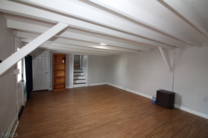 171 Stanton Road, Unit A Flemington, NJ 08822 - Photo 10 of 12 a view of an empty room with a window