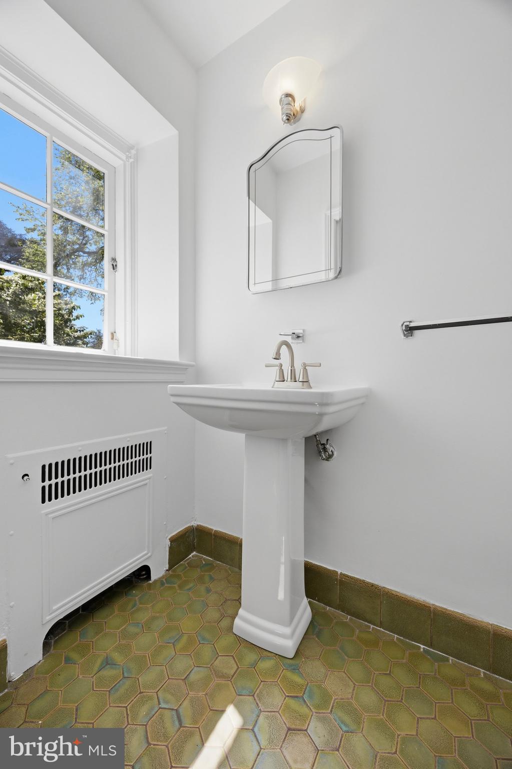 326 Winding Way Merion Station, PA 19066 - Photo 14 of 33 a bathroom with a sink and a mirror