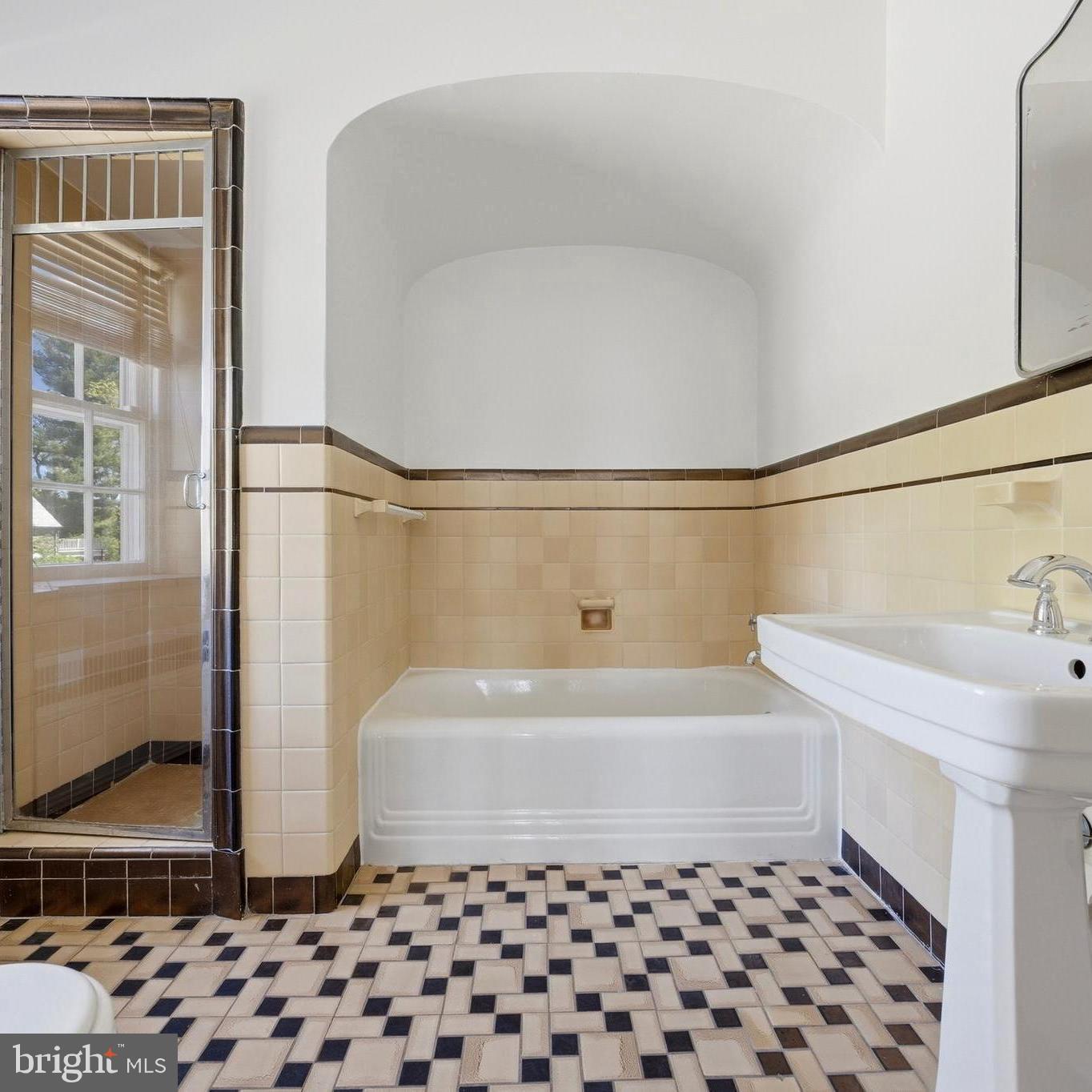 326 Winding Way Merion Station, PA 19066 - Photo 17 of 33 a bathroom with a bathtub and a sink