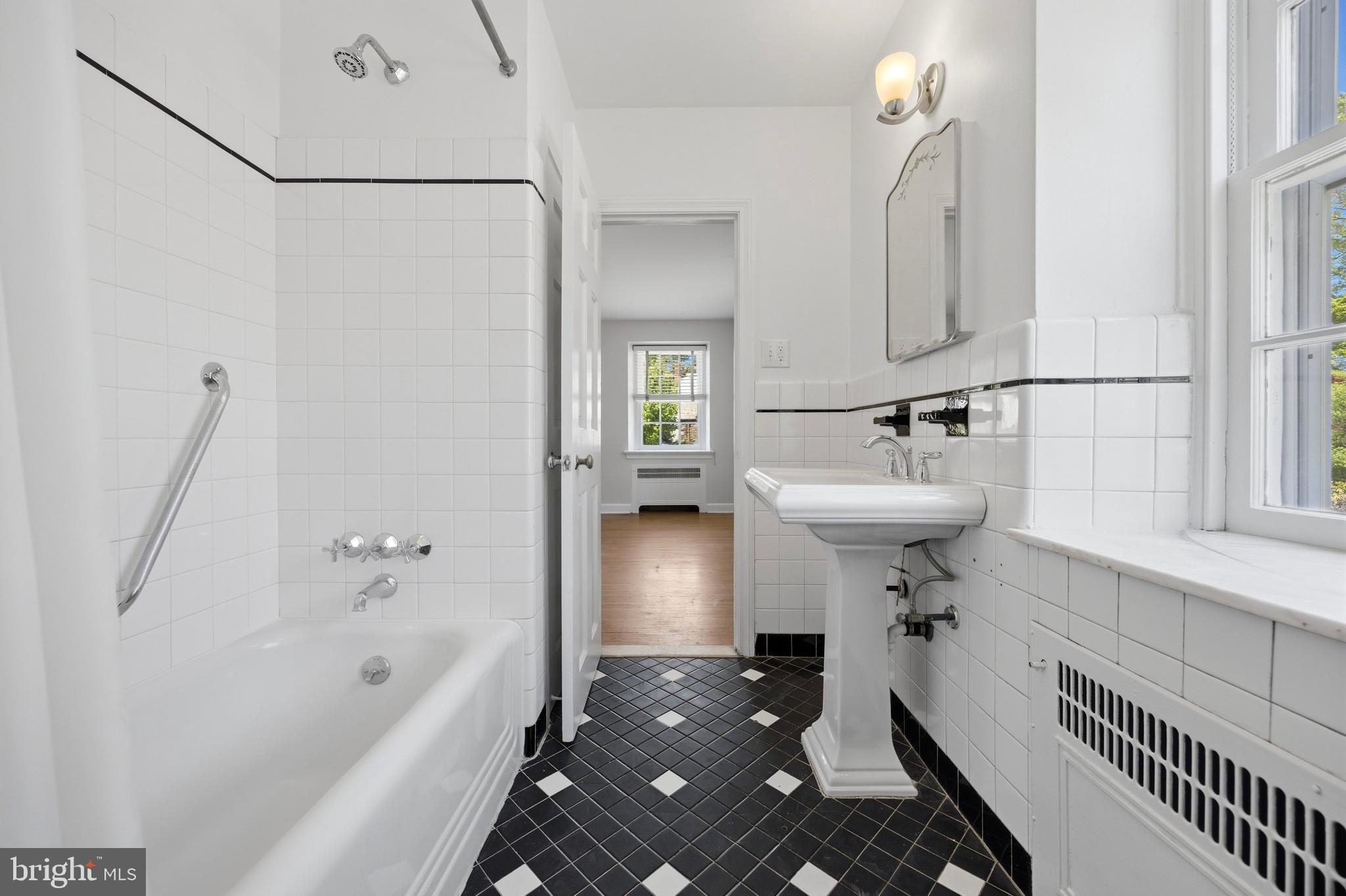 326 Winding Way Merion Station, PA 19066 - Photo 20 of 33 a bathroom with a sink toilet and shower