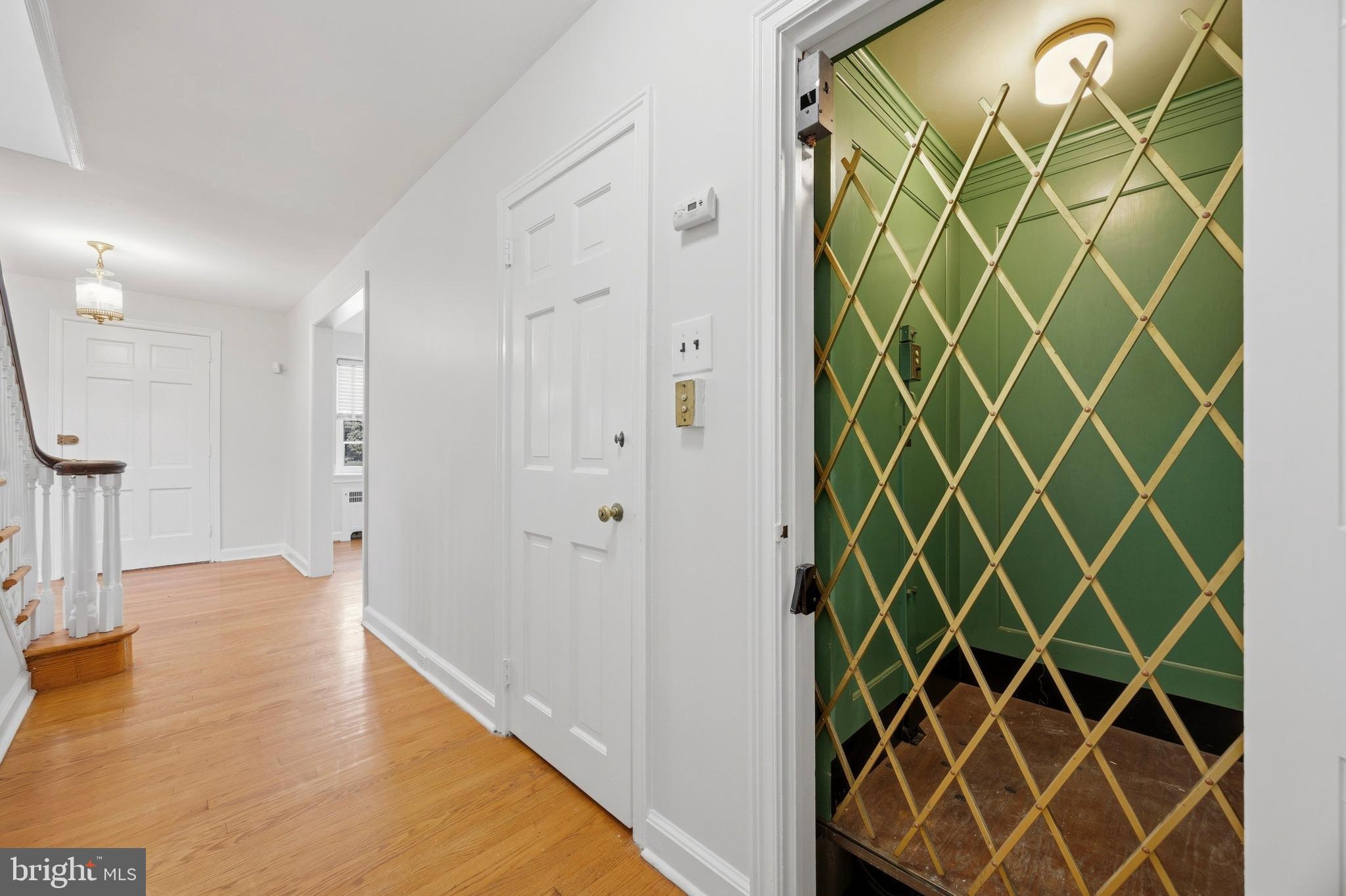 326 Winding Way Merion Station, PA 19066 - Photo 21 of 33 a view of empty room with wooden floor and door