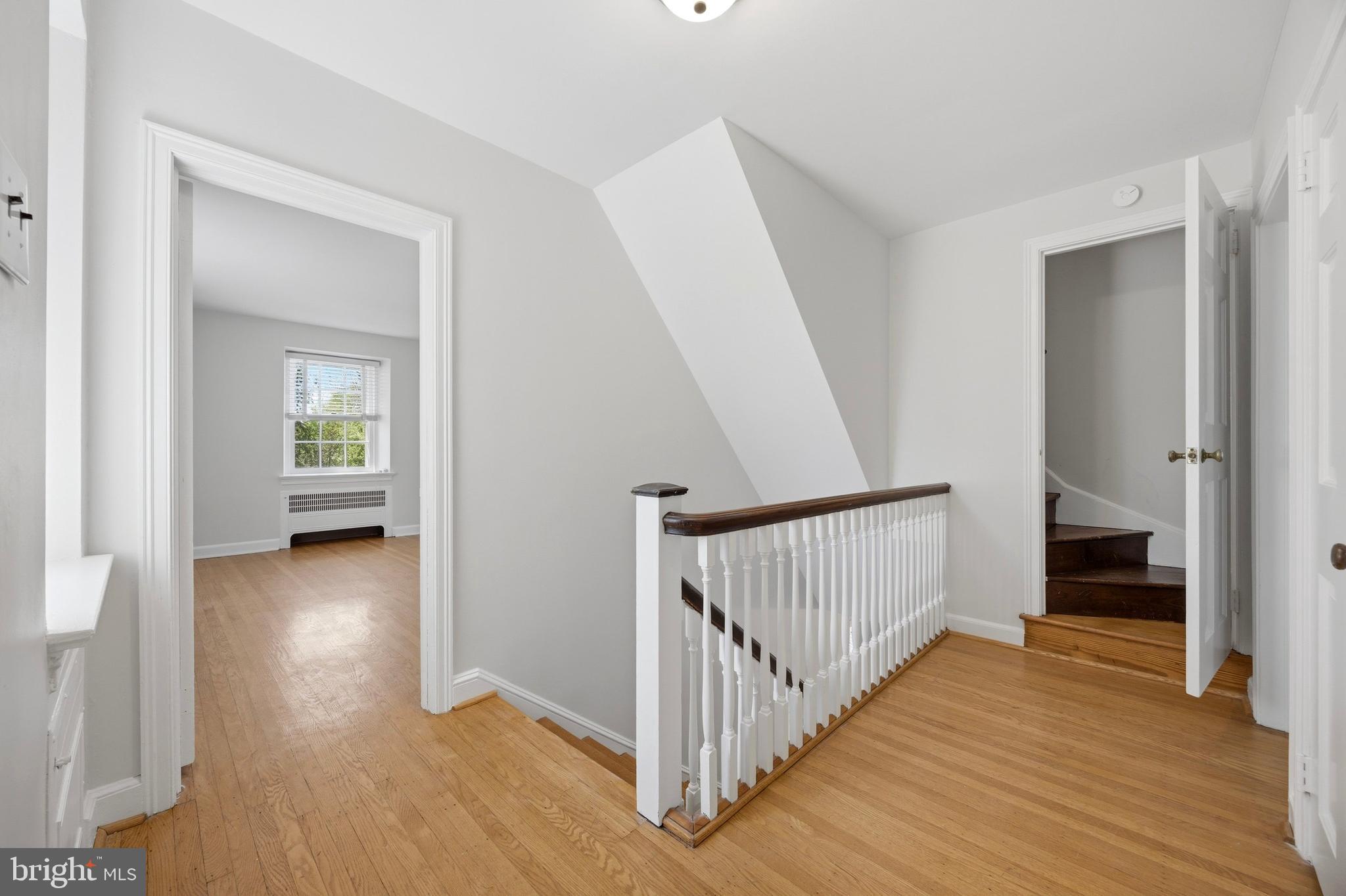 326 Winding Way Merion Station, PA 19066 - Photo 26 of 33 a view of a hallway view with wooden floor and staircase