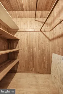 a view of an empty room with stairs
