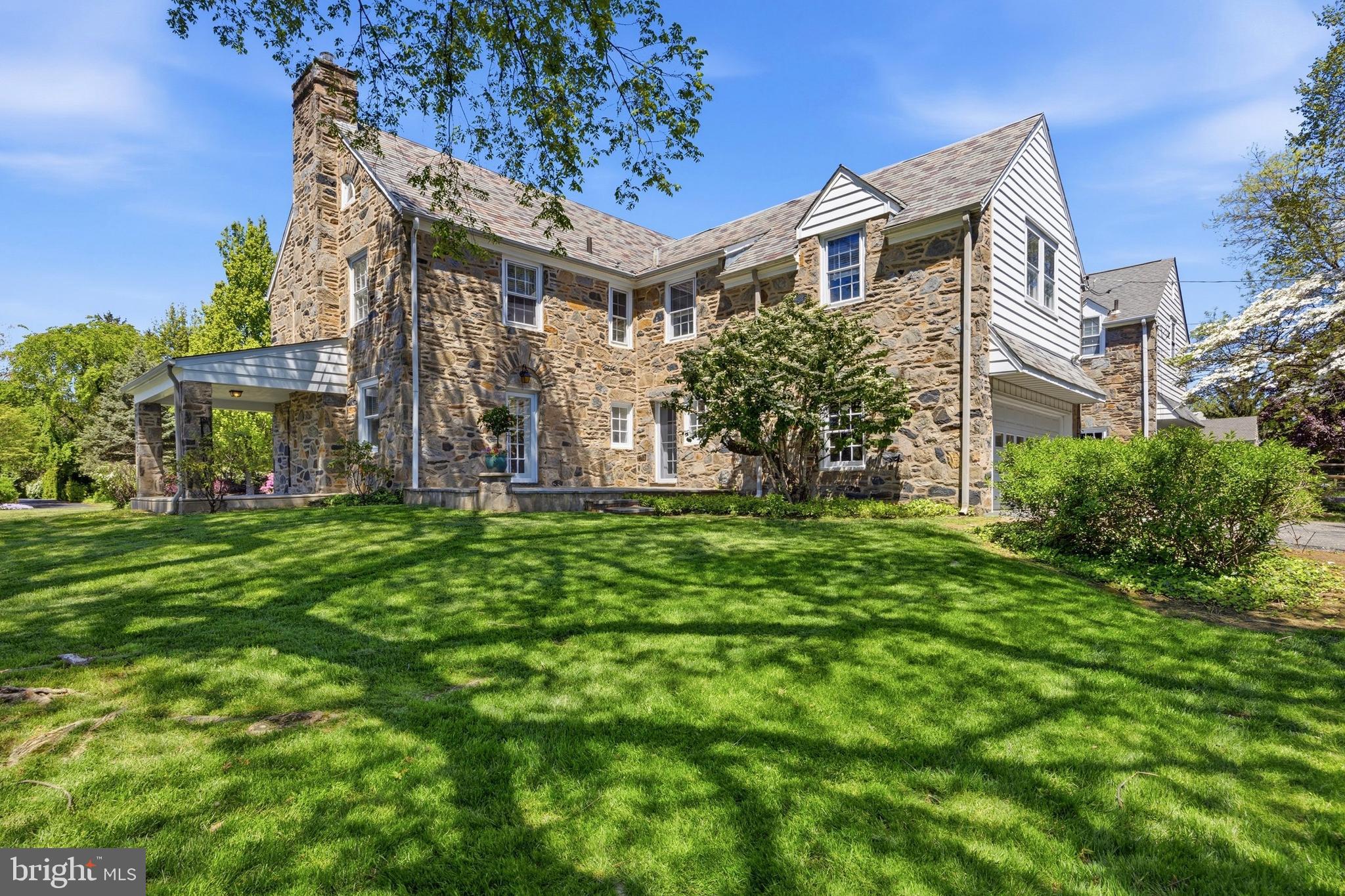 326 Winding Way Merion Station, PA 19066 - Photo 33 of 33 a front view of a house with garden