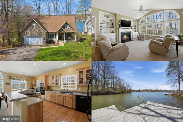 a view of living room kitchen with furniture and fireplace