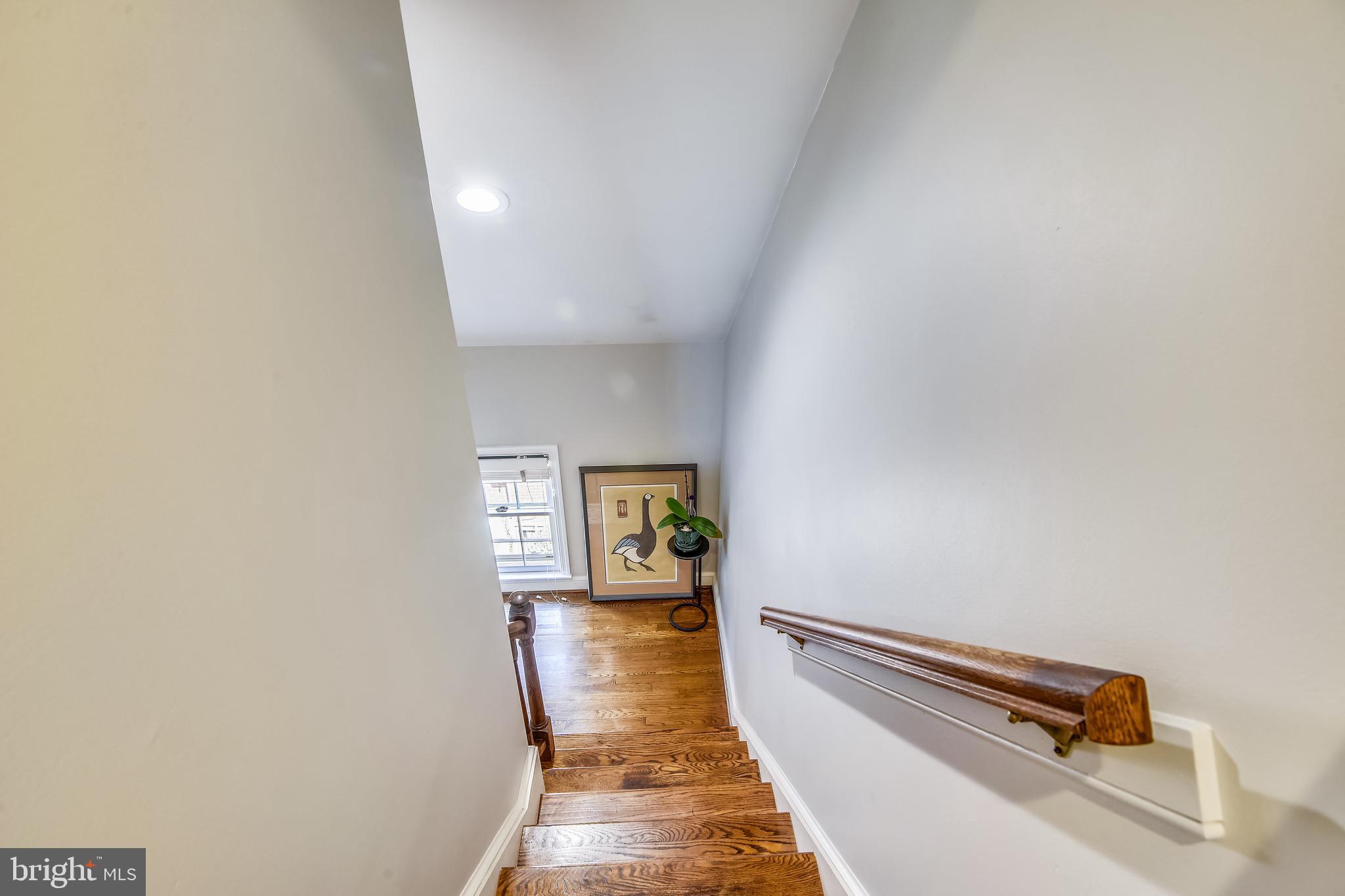 1239 Portner Road Alexandria, VA 22314 - Photo 42 of 73 Headed back downstairs from the top floor