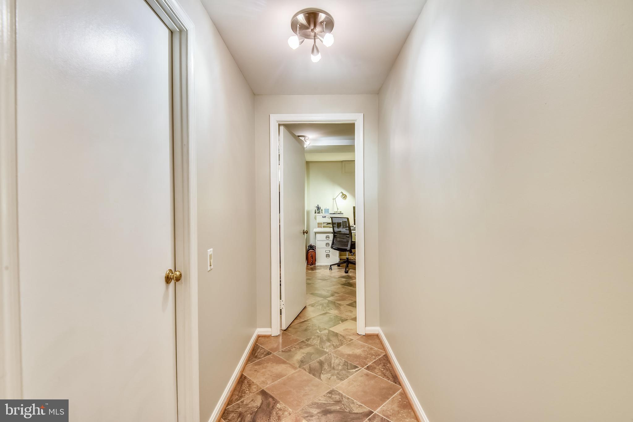 1239 Portner Road Alexandria, VA 22314 - Photo 46 of 73 door to storage room, hallway to bonus room