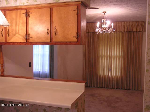 5174 Eulace Road Jacksonville, FL 32210 - Photo 8 of 17 Looking into dining room from kitchen