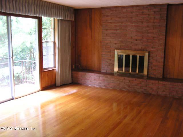 5174 Eulace Road Jacksonville, FL 32210 - Photo 9 of 17 Family room with fireplace