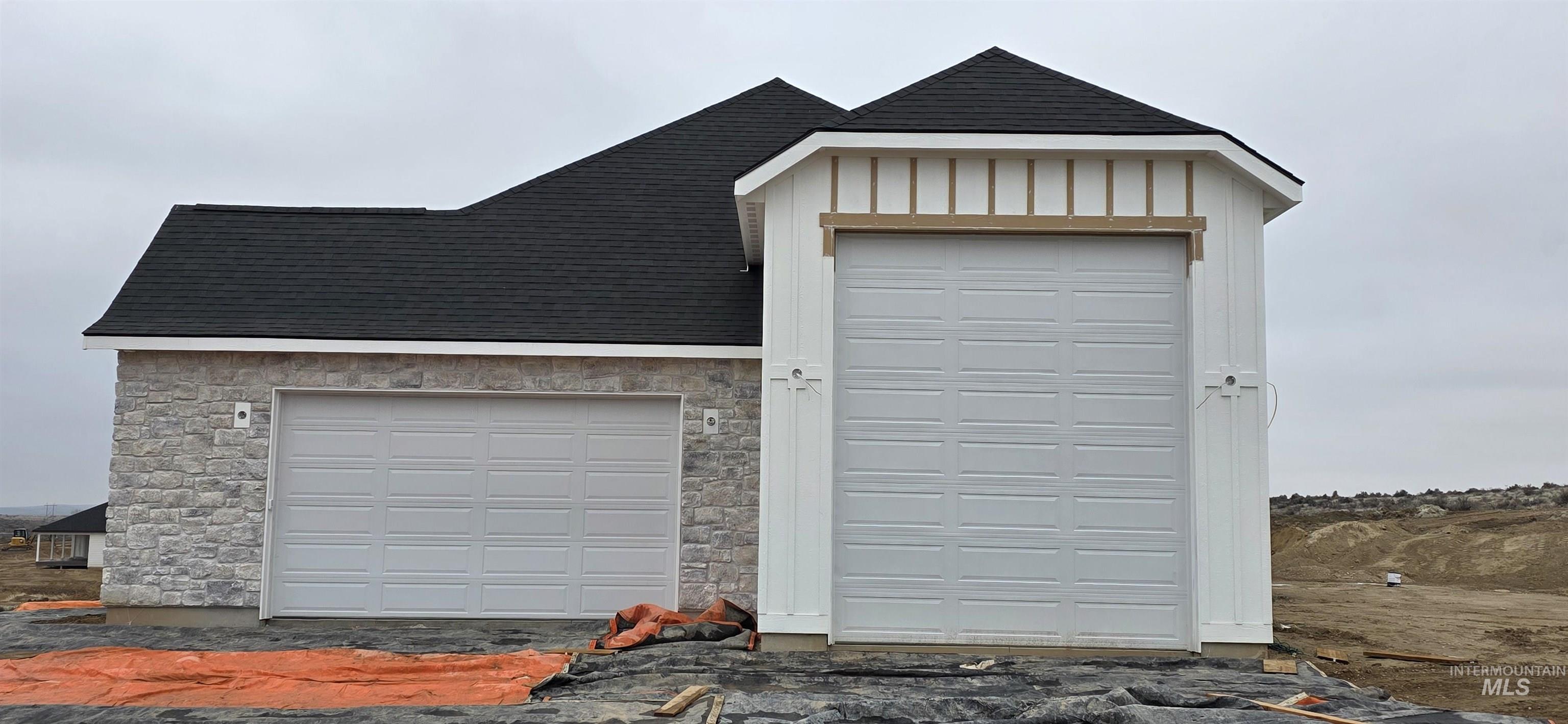 17244 Triple Crown Place Caldwell, ID 83607 - Photo 3 of 8 View of garage