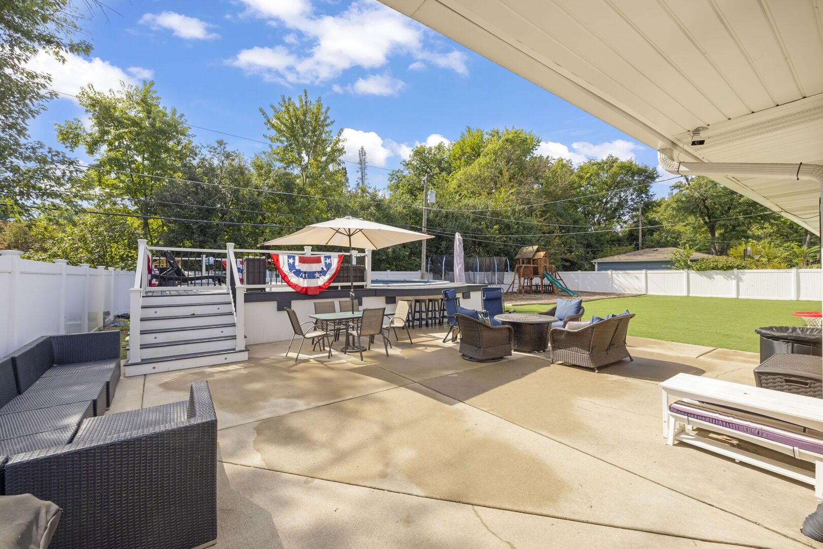 2245 Hawthorne Road Homewood, IL 60430 - Photo 5 of 8 a view of a chairs and table in the back yard of the house