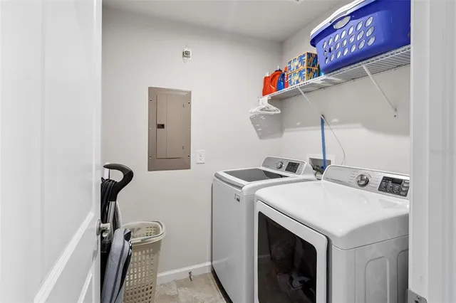 a utility room with dryer and washer