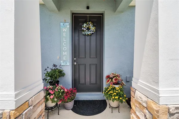 a vase of flowers sitting on a table
