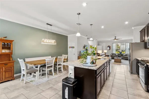 a view of a dining room with furniture