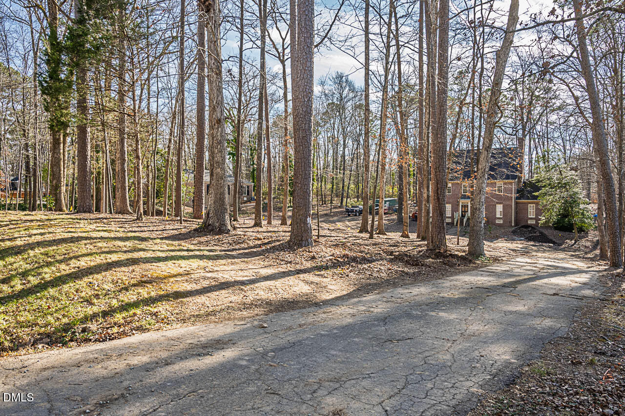 4012 Nottaway Road Durham, NC 27707 - Photo 5 of 15 Sixty-foot road frontage for access to 1.35-acre back lot.