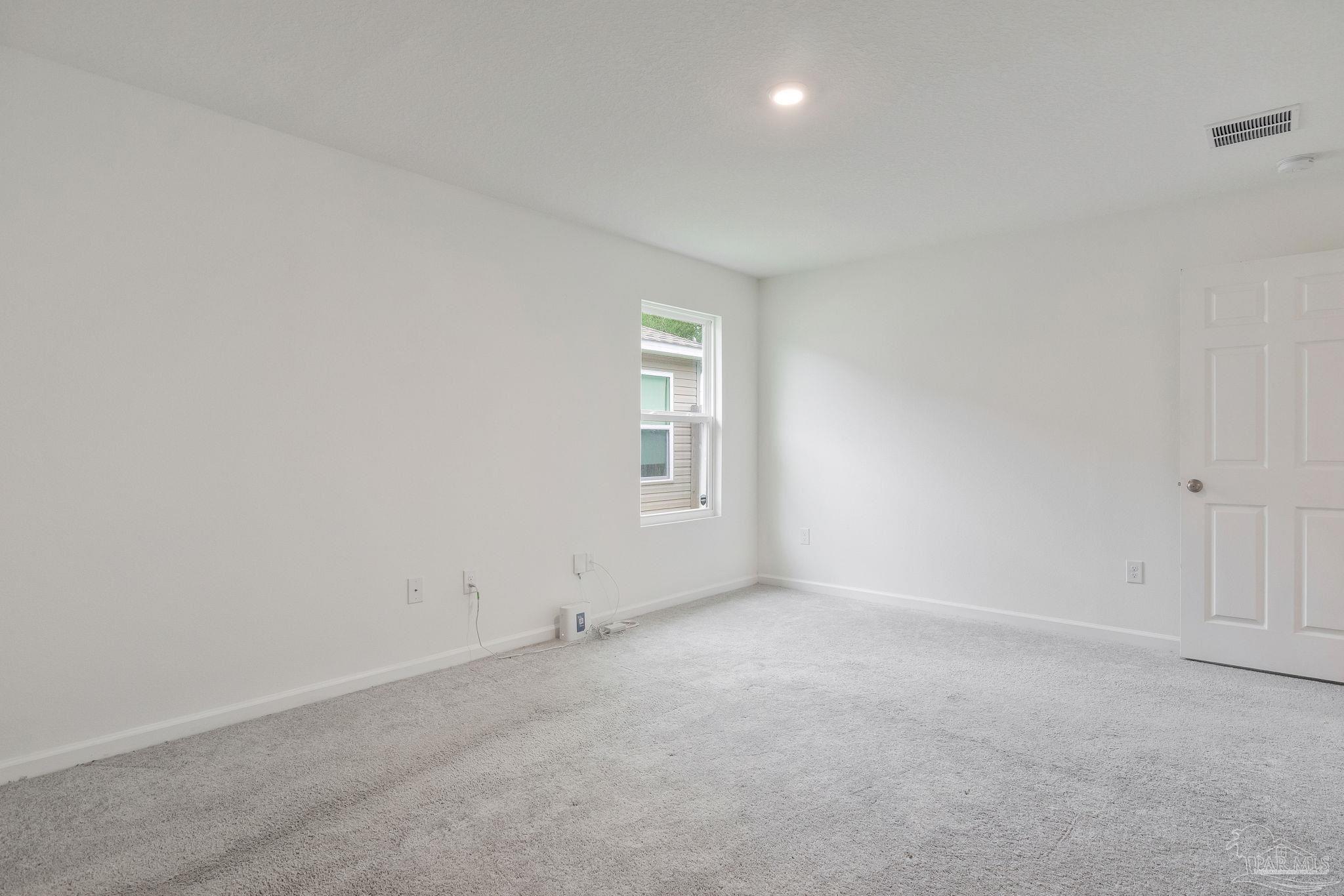 1625 Addies Way Pensacola, FL 32534 - Photo 23 of 50 an empty room with windows