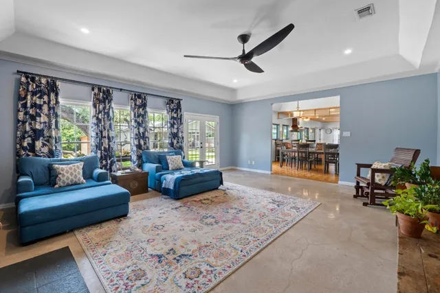 a living room with furniture and a window