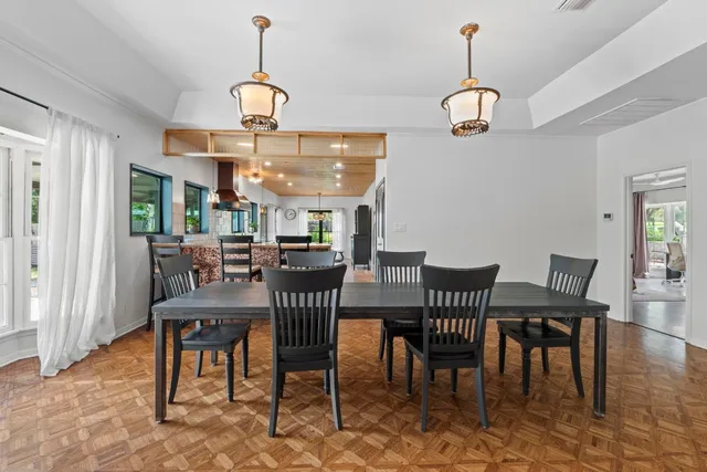 a bedroom with a bed and flat screen tv