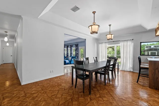 a bedroom with a bed and a mirror