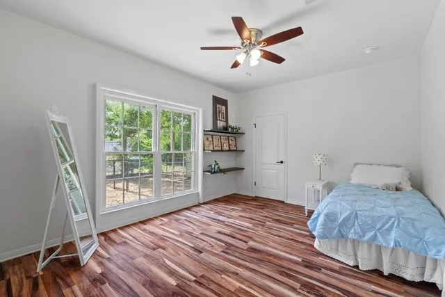a kitchen with a refrigerator and a sink