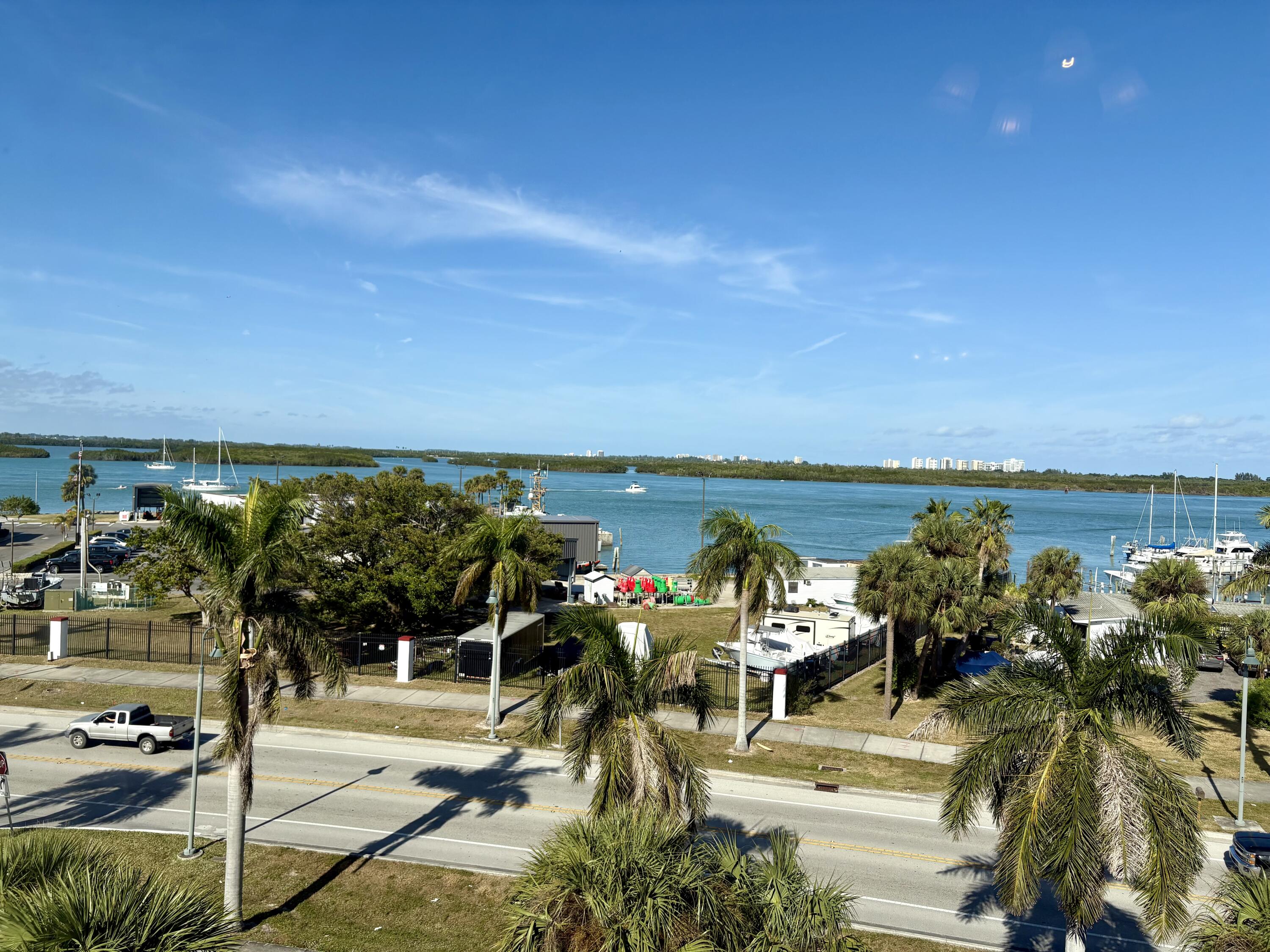 38 Harbour Isle Drive East, Unit PH01 Fort Pierce, FL 34949 - Photo 30 of 30 a view of a terrace with lawn chairs