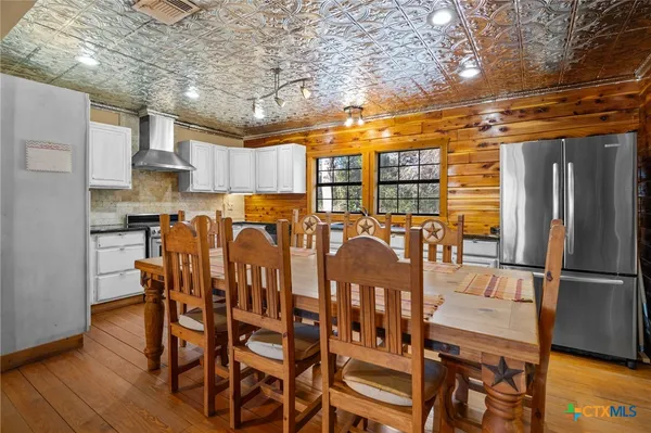 a view of a dining room with furniture