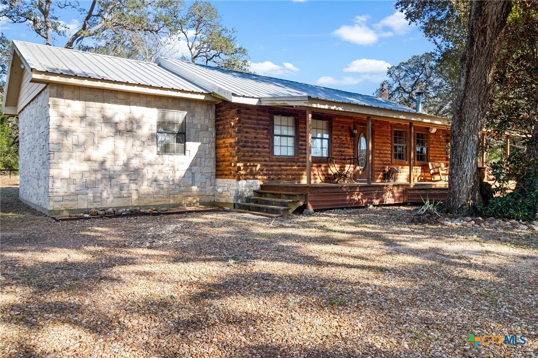1465 County Road 401 Edna, TX 77957 - Photo 3 of 46 a view of a house with a yard