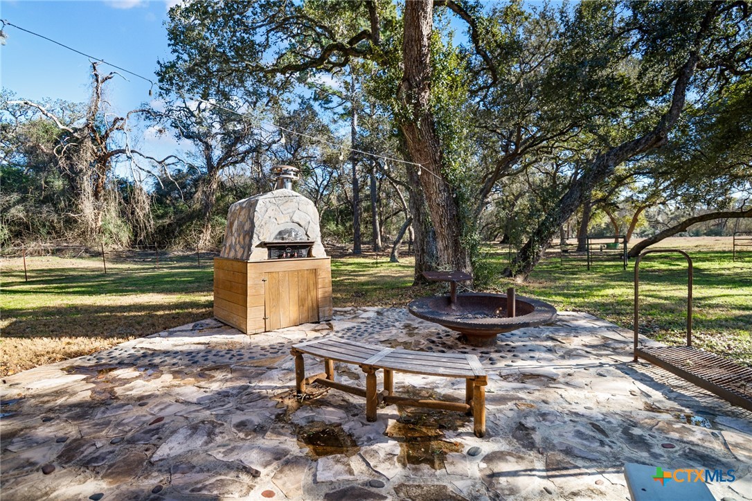 1465 County Road 401 Edna, TX 77957 - Photo 10 of 46 a view of a park with large trees