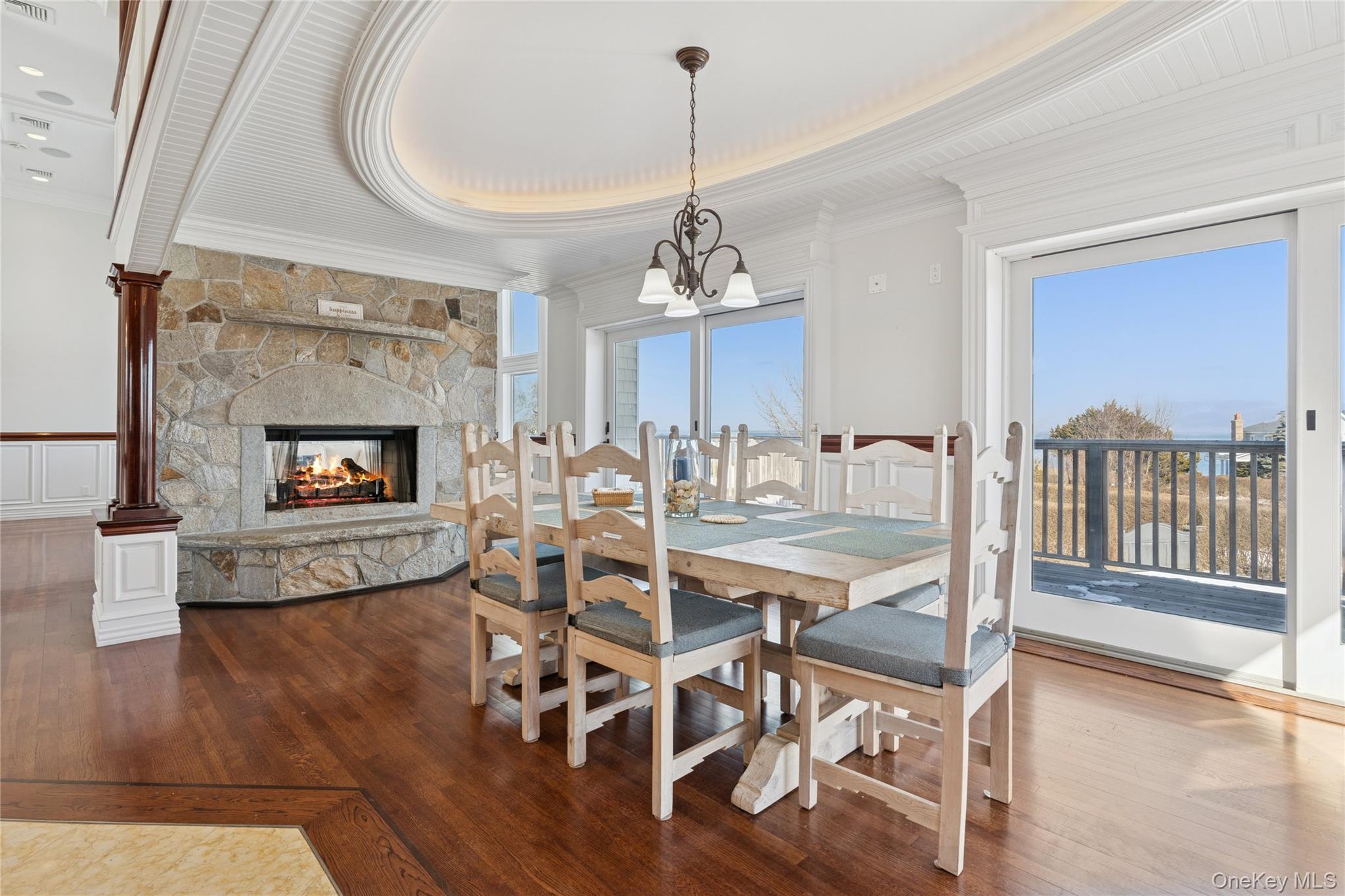 1680 Lands End Road Orient, NY 11957 - Photo 14 of 50 Formal Open Dining Room with Fireplace