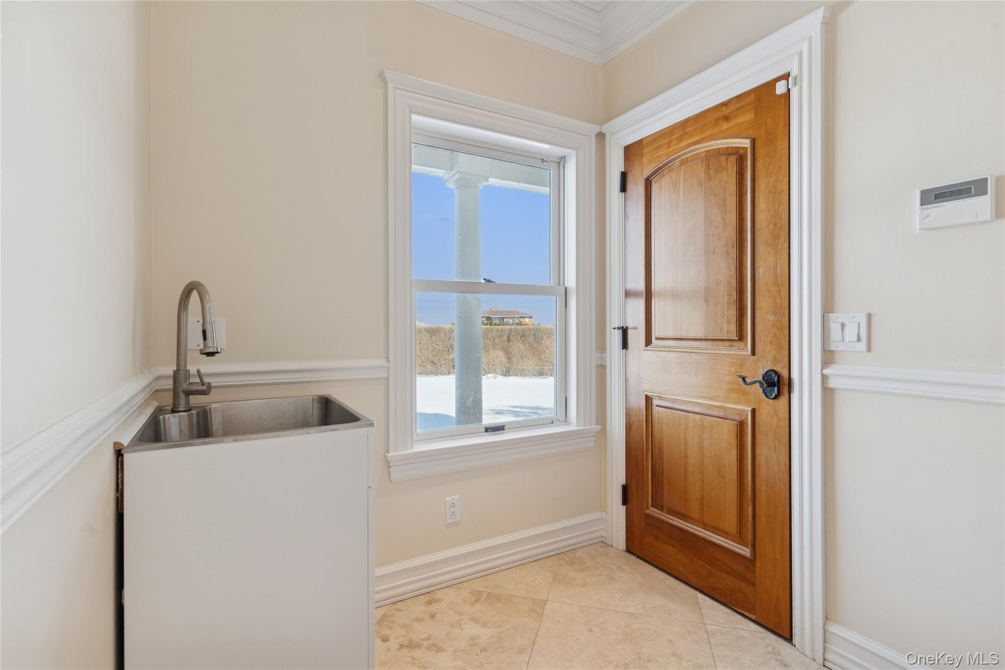 1680 Lands End Road Orient, NY 11957 - Photo 37 of 50 Mud Room with Sink Also Includes Storage Closet not shown in photo