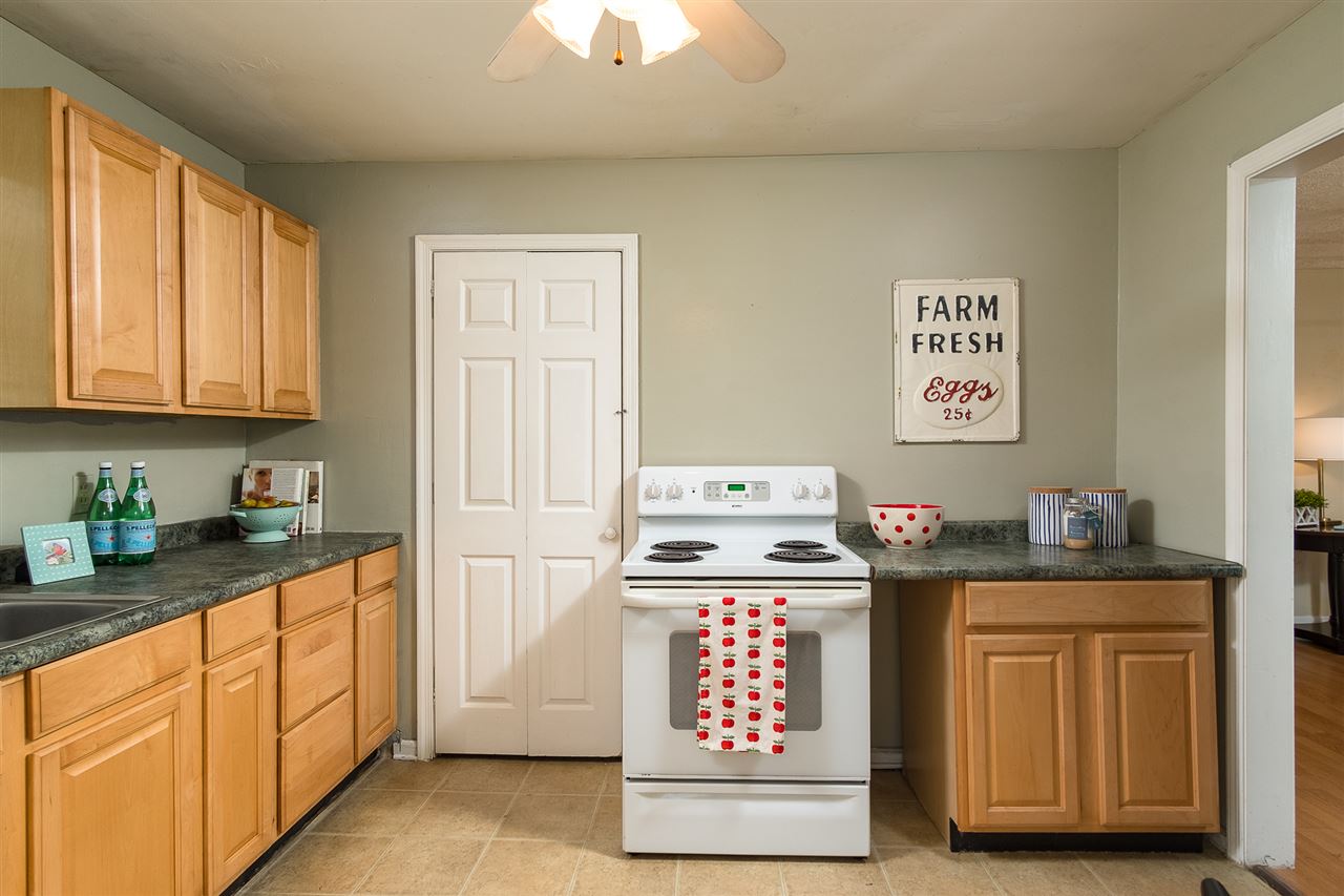 133 Quick's Mill Road Verona, VA 24482 - Photo 8 of 16 a kitchen with stainless steel appliances granite countertop a stove a sink and cabinets